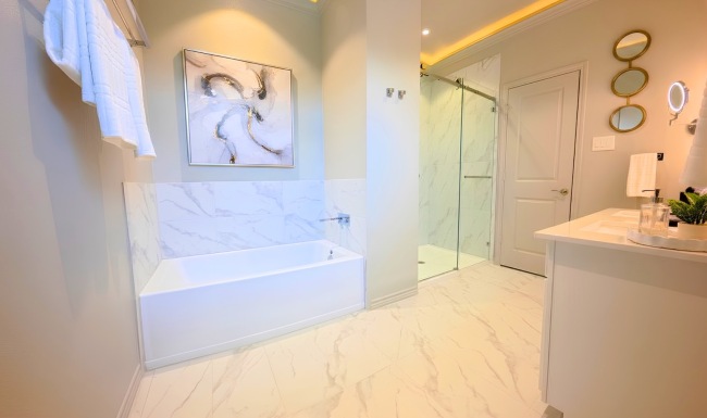 a bathroom with a tub and a shower