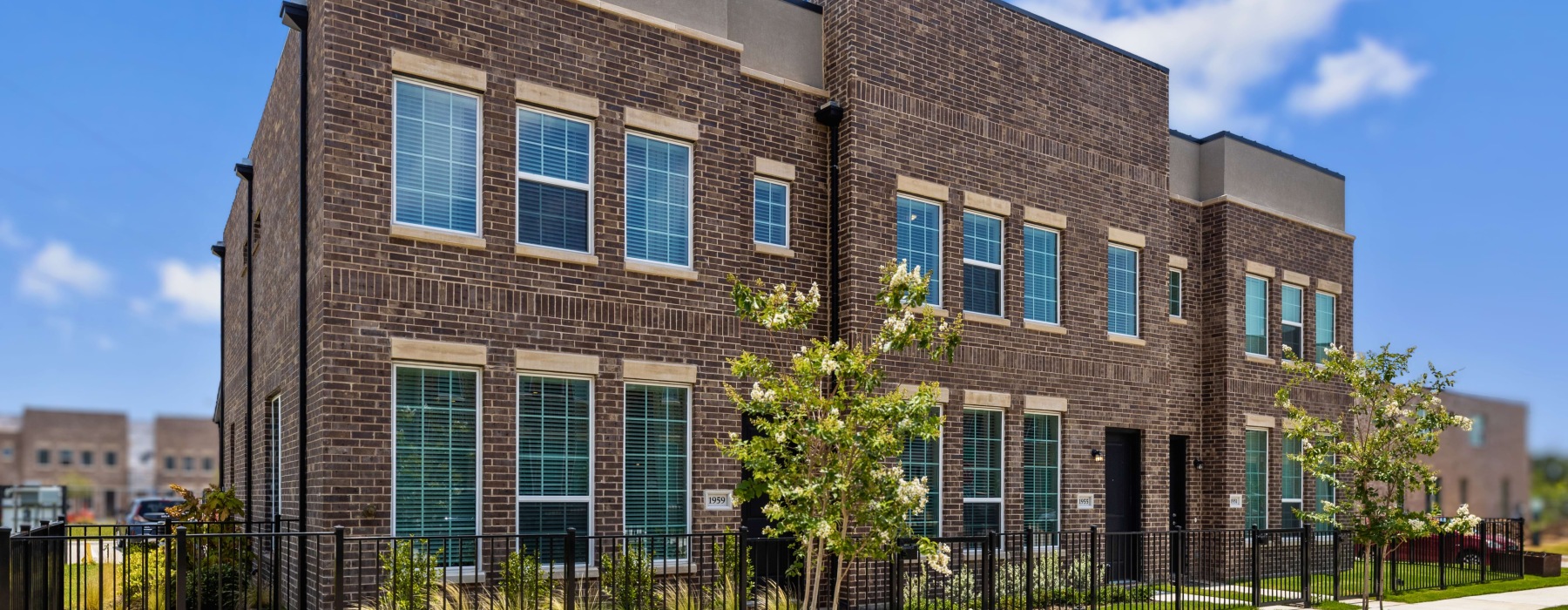 Exterior of 3-bedroom townhomes at Frontera Shores in Lewisville, TX